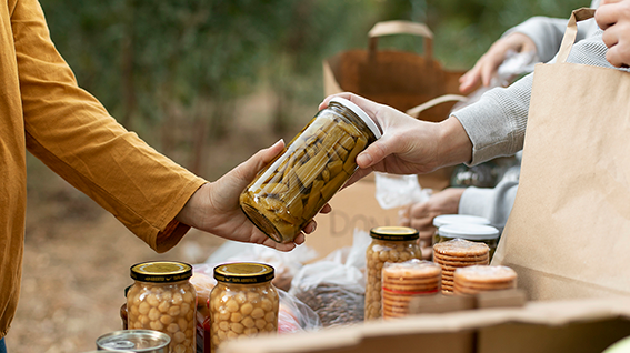 close-up-people-holding-jar